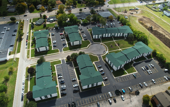 Apartment Complex with New Green Asphalt Shingle roofs