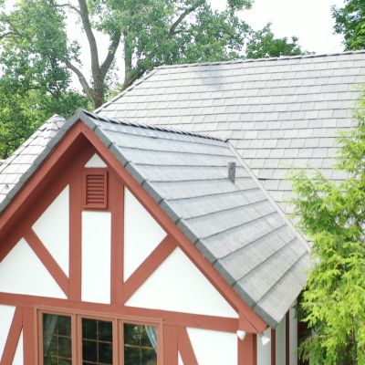 Post and beam style home with synthetic shingle roof replacement